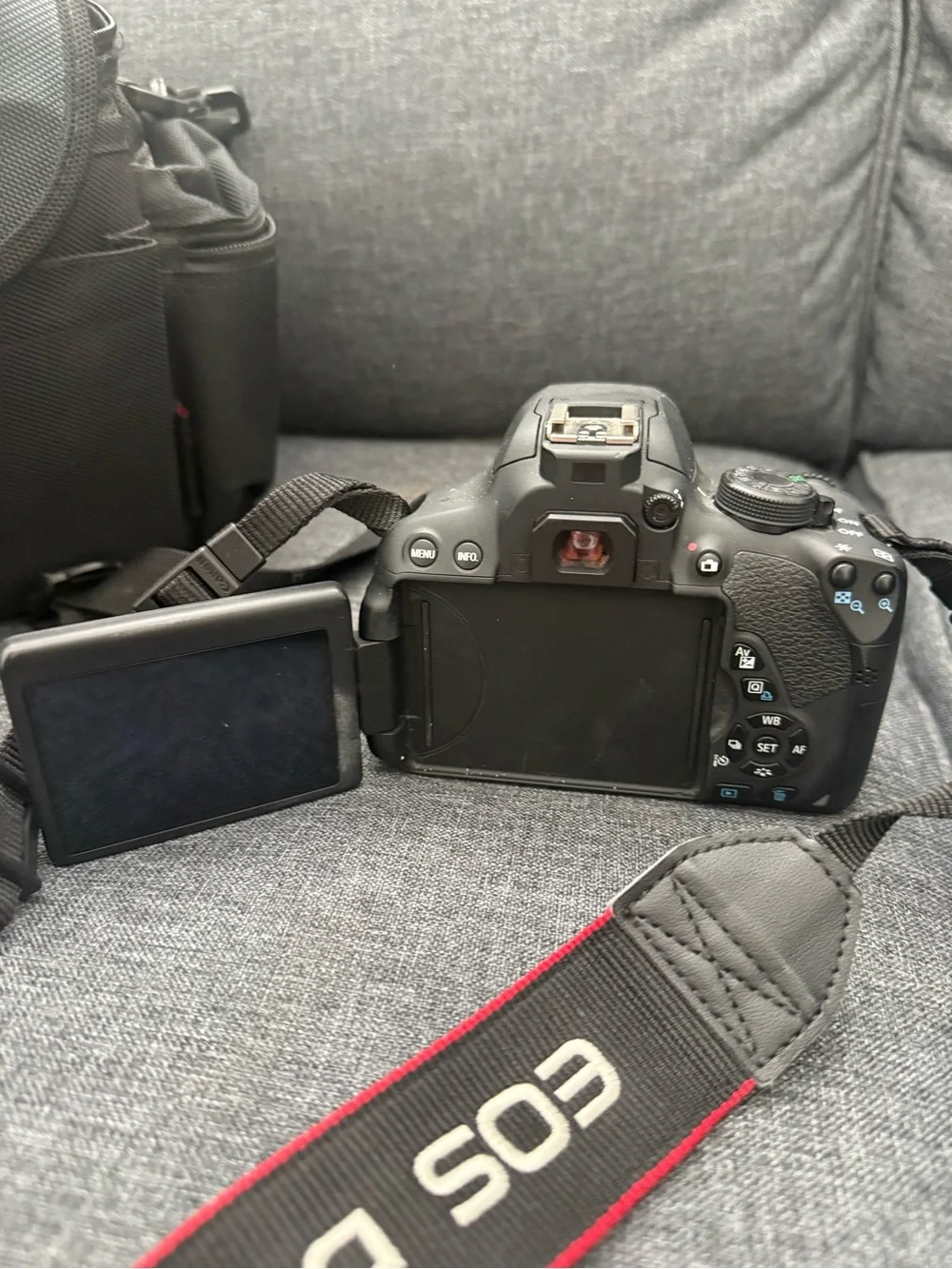 Canon Black DSLR with Two Interchangeable Lenses and Canon Rebel Bag